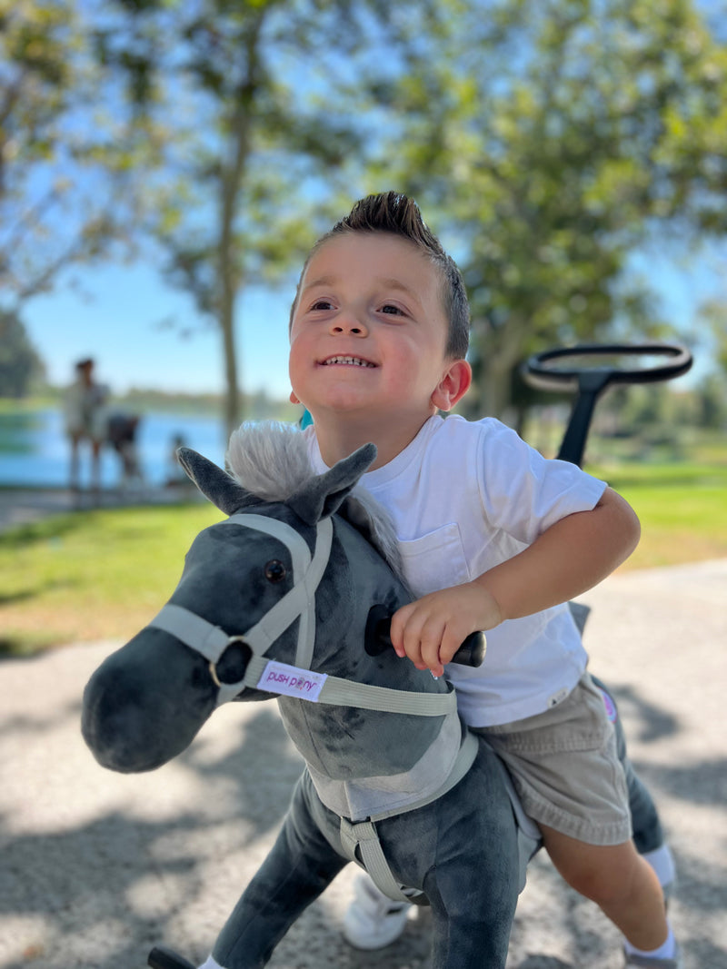 Pure joy on his face as he rides his trusty Power Pony! Ready for adventure, he's all smiles and unstoppable fun!